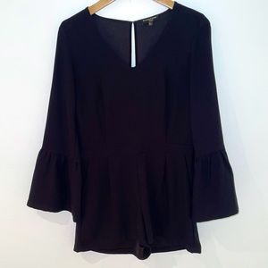 Long, bell sleeve business casual romper, black